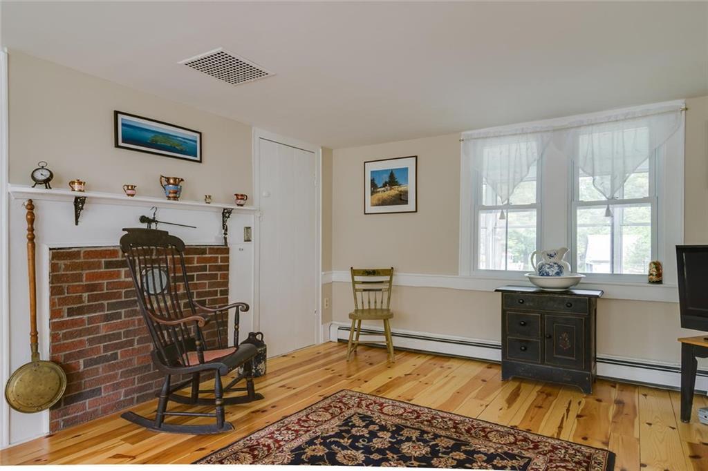 747 Sebago Road Sebago, ME 04029 - Photo 20 of 34 Farmhouse living room..