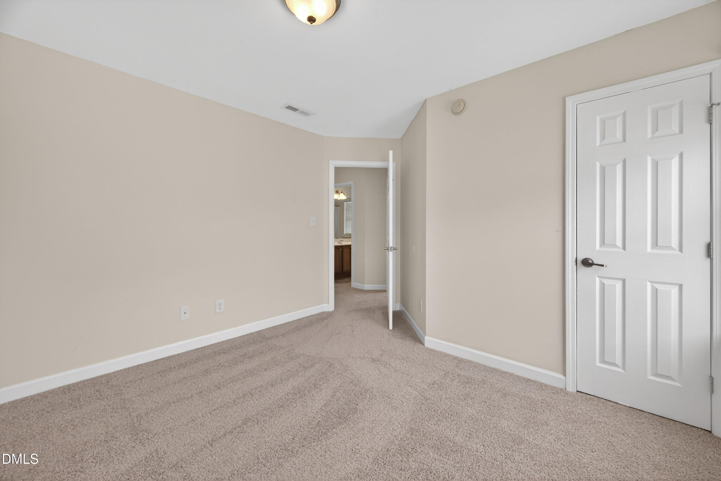 5304 Stone Station Drive Raleigh, NC 27616 - Photo 20 of 34 an empty room with a natural light