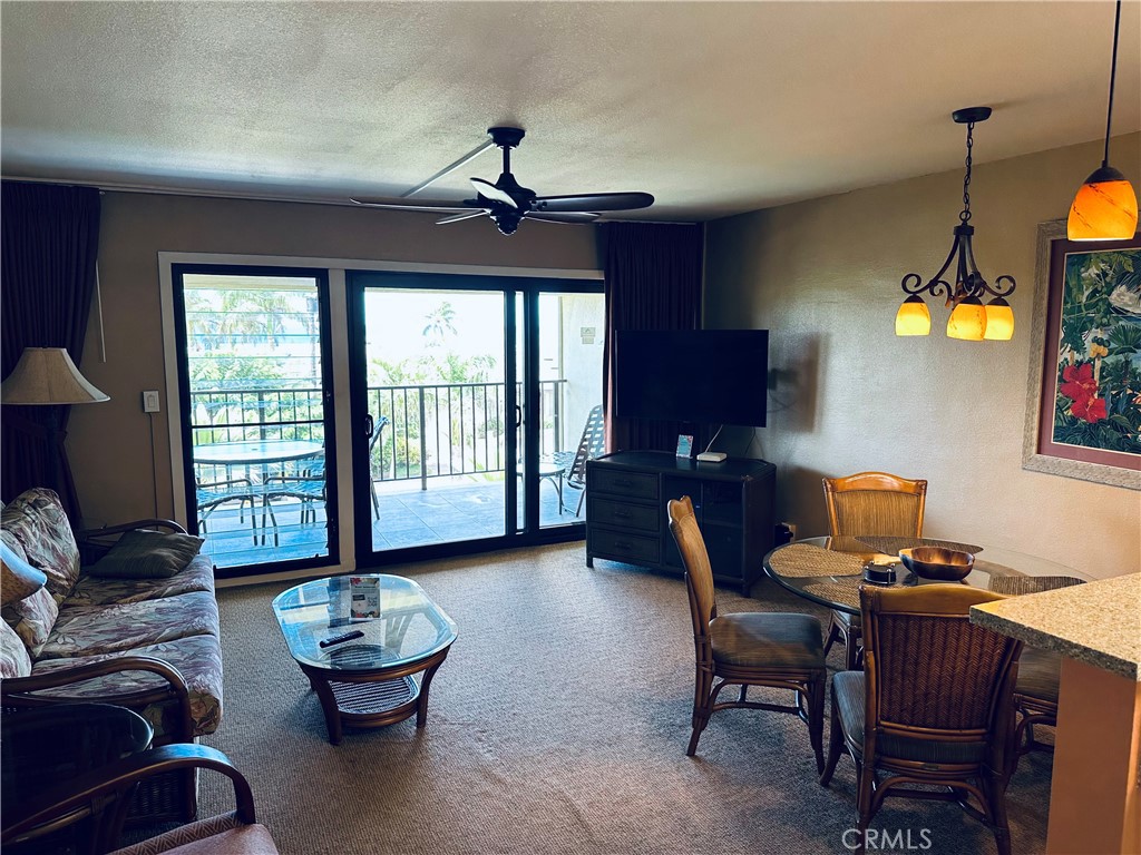 5017 Lawai Road Koloa, HI 96756 - Photo 3 of 10 a living room with furniture and a window