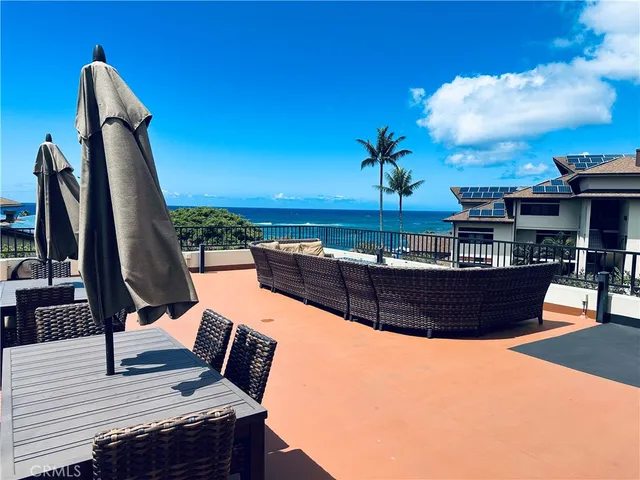 a view of a chairs and table in the terrace