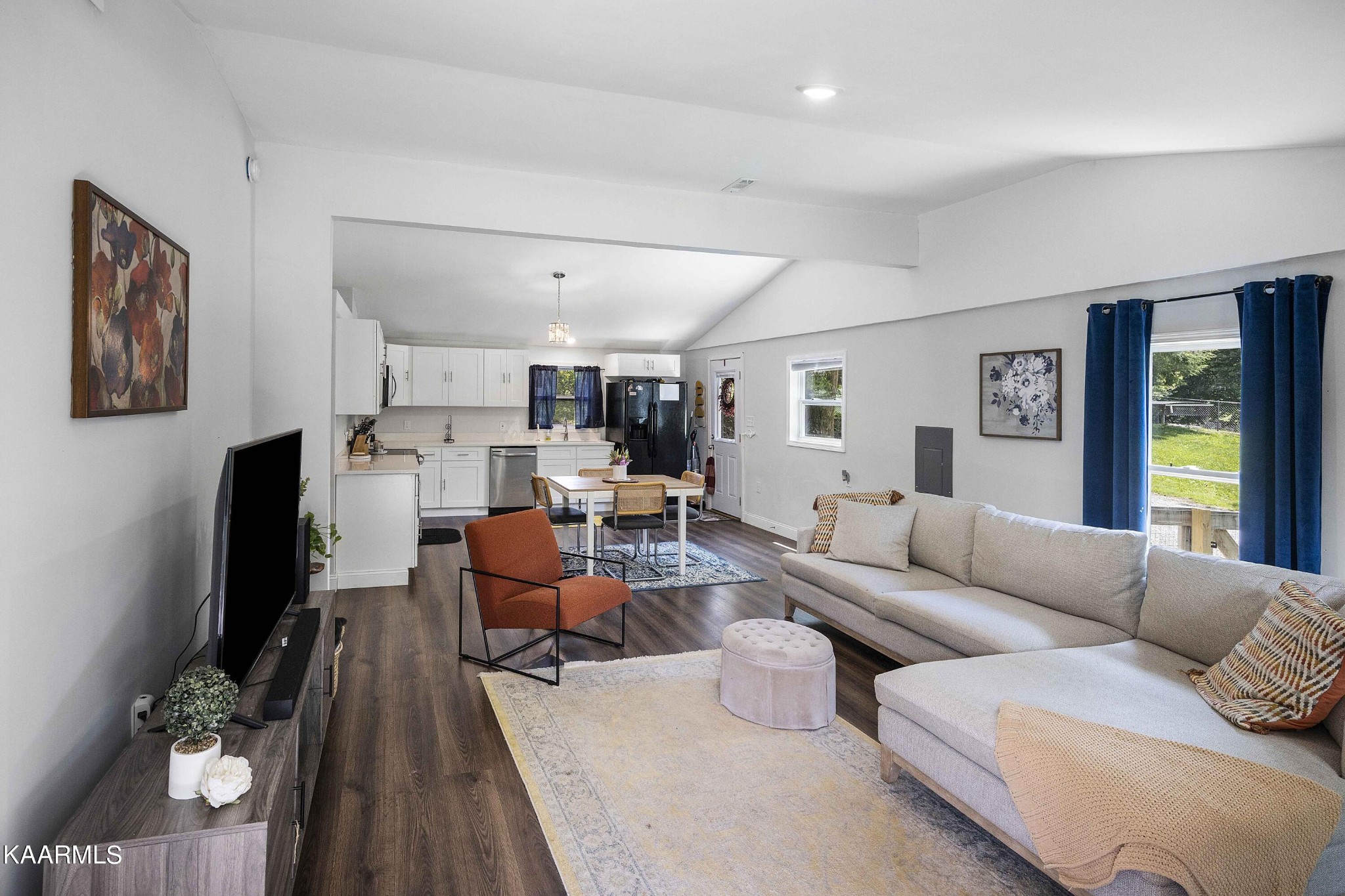 1000 Tarklin Valley Road Knoxville, TN 37920 - Photo 12 of 26 a living room with furniture kitchen view and a large window