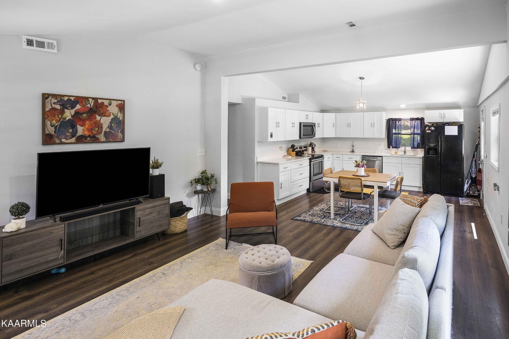 1000 Tarklin Valley Road Knoxville, TN 37920 - Photo 13 of 26 a living room with furniture and a flat screen tv