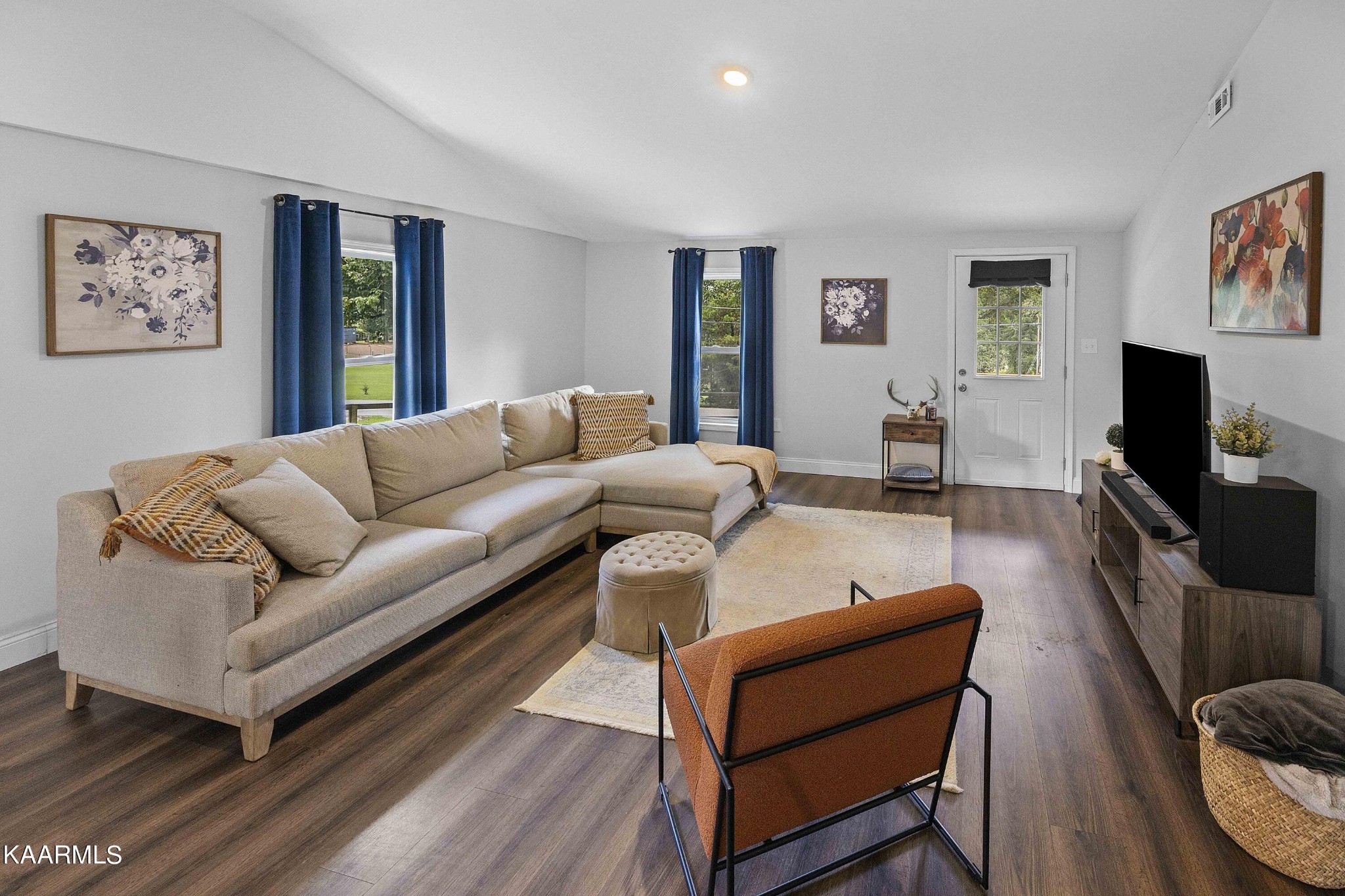 1000 Tarklin Valley Road Knoxville, TN 37920 - Photo 14 of 26 a living room with furniture and a flat screen tv