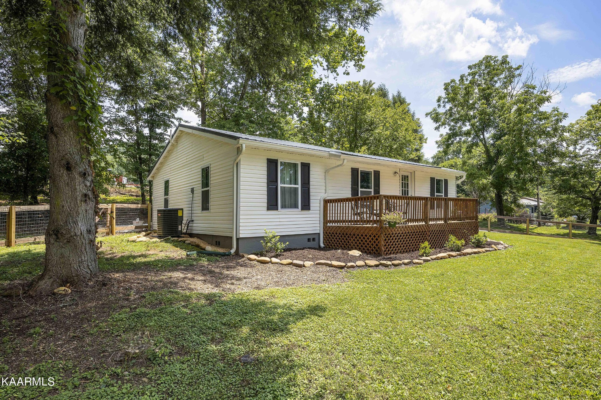 1000 Tarklin Valley Road Knoxville, TN 37920 - Photo 24 of 26 a view of a house with yard and sitting area