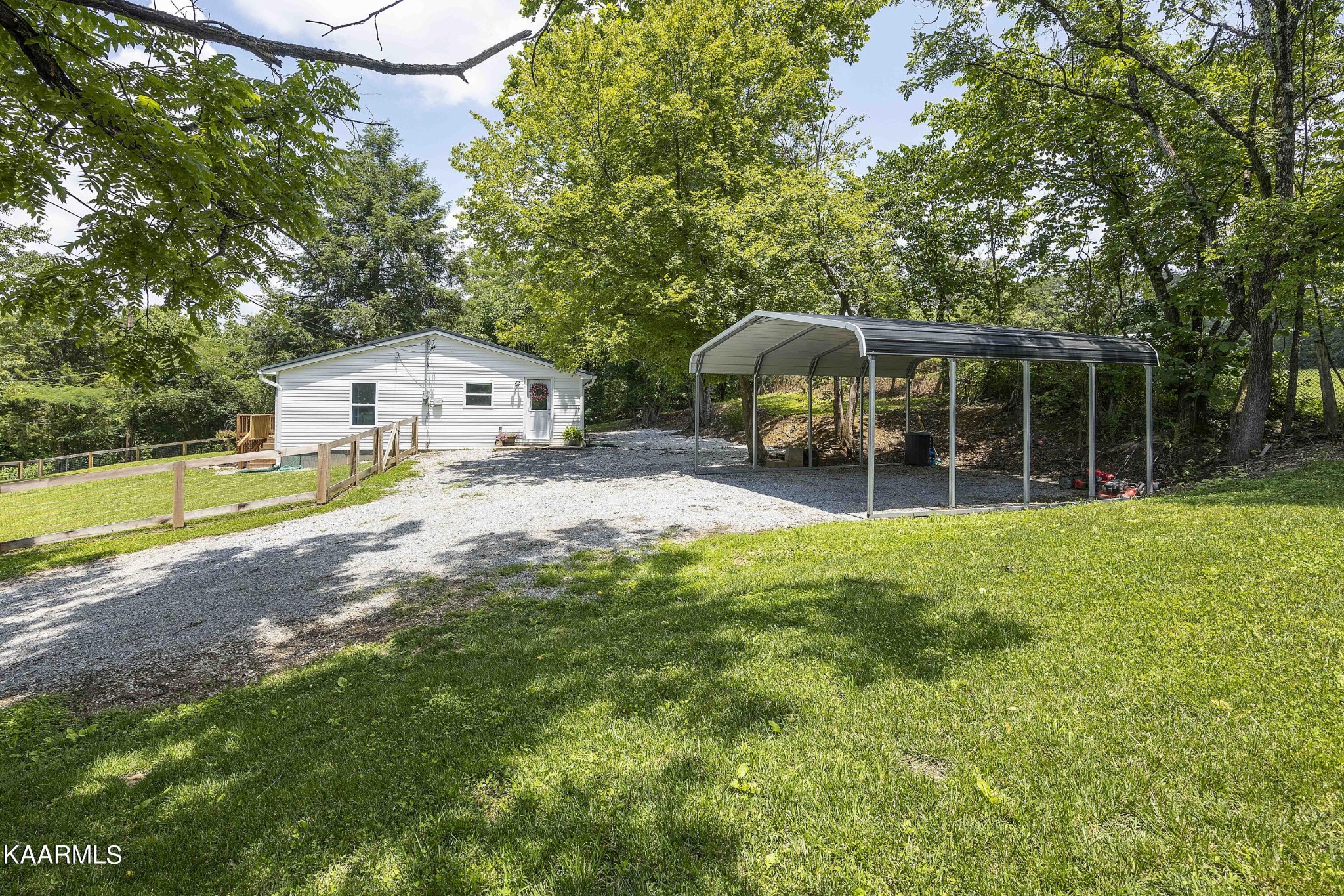 1000 Tarklin Valley Road Knoxville, TN 37920 - Photo 3 of 26 a view of a house with a yard and sitting area