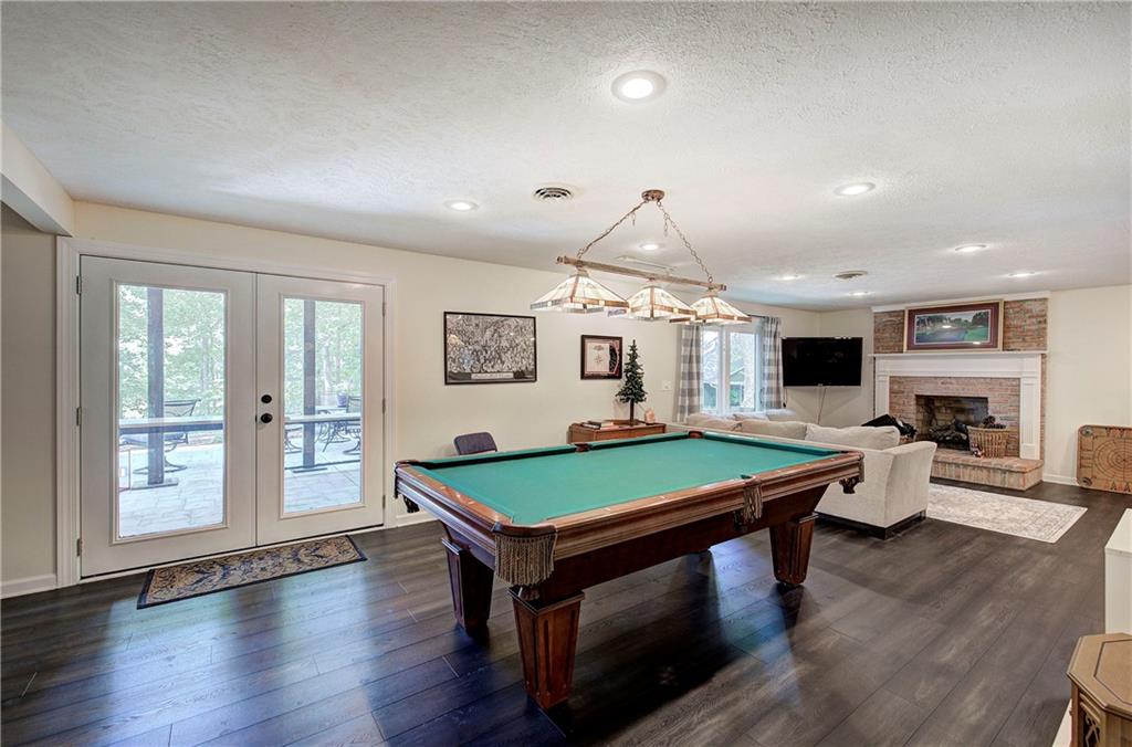 12 Tamarack Point Jasper, GA 30143 - Photo 45 of 83 a room with furniture pool table wooden floor and windows