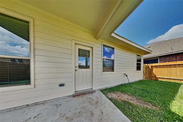 a view of a backyard with garage