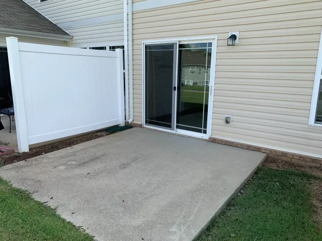a view of a backyard of the house