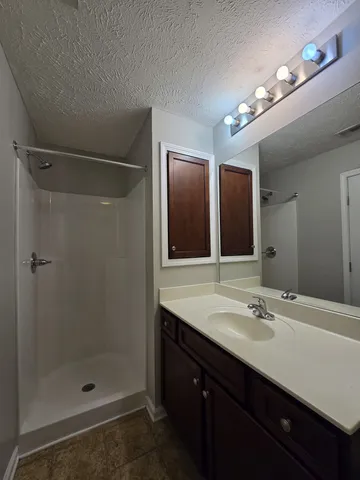 a front view of a house with yard