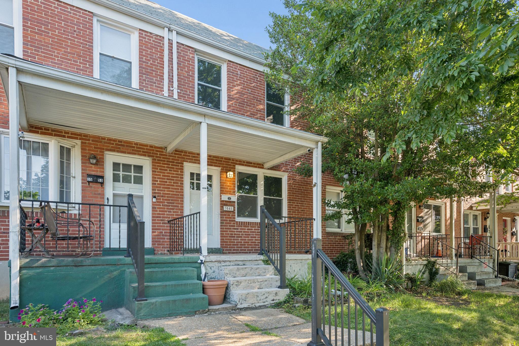3548 Benzinger Road Baltimore, MD 21229 - Photo 2 of 40 front view of a house with a yard
