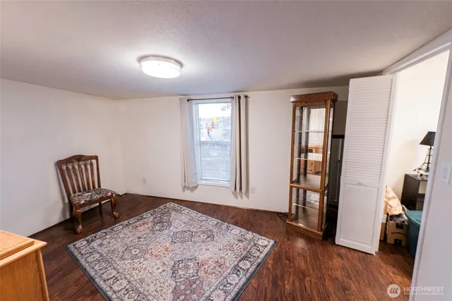 wooden floor with windows and hardwood floor