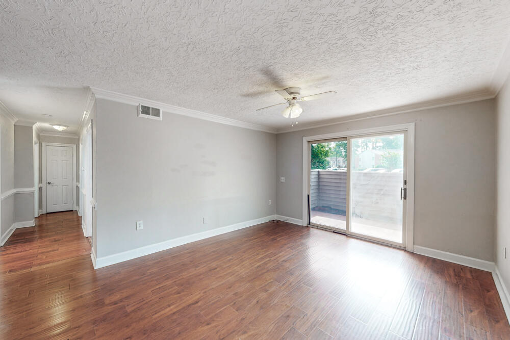 1017 Stevens Creek Road, Unit G185 Augusta, GA 30907 - Photo 2 of 21 Living Room with Patio Access!