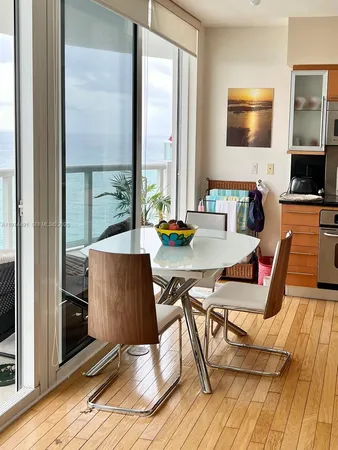 a living room with a couch and a flat screen tv