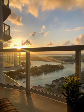 a view of a lake from a balcony