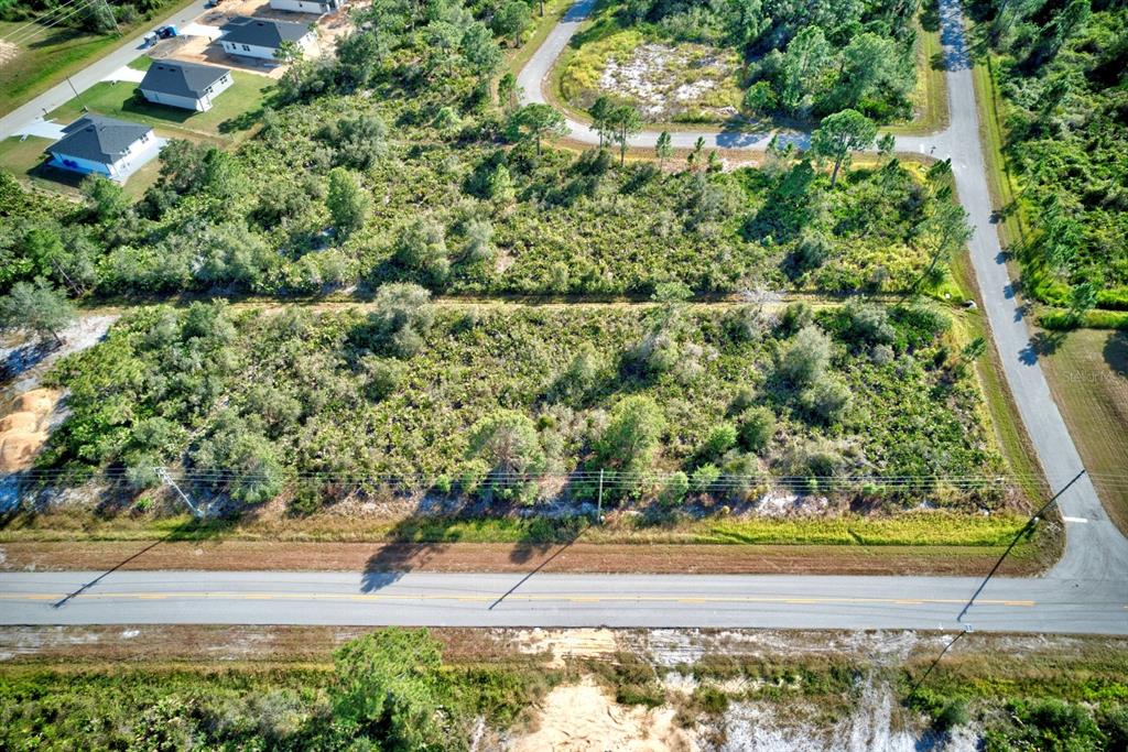 5316 Manati Avenue Sebring, FL 33872 - Photo 11 of 17 a view of a yard with an outdoor space