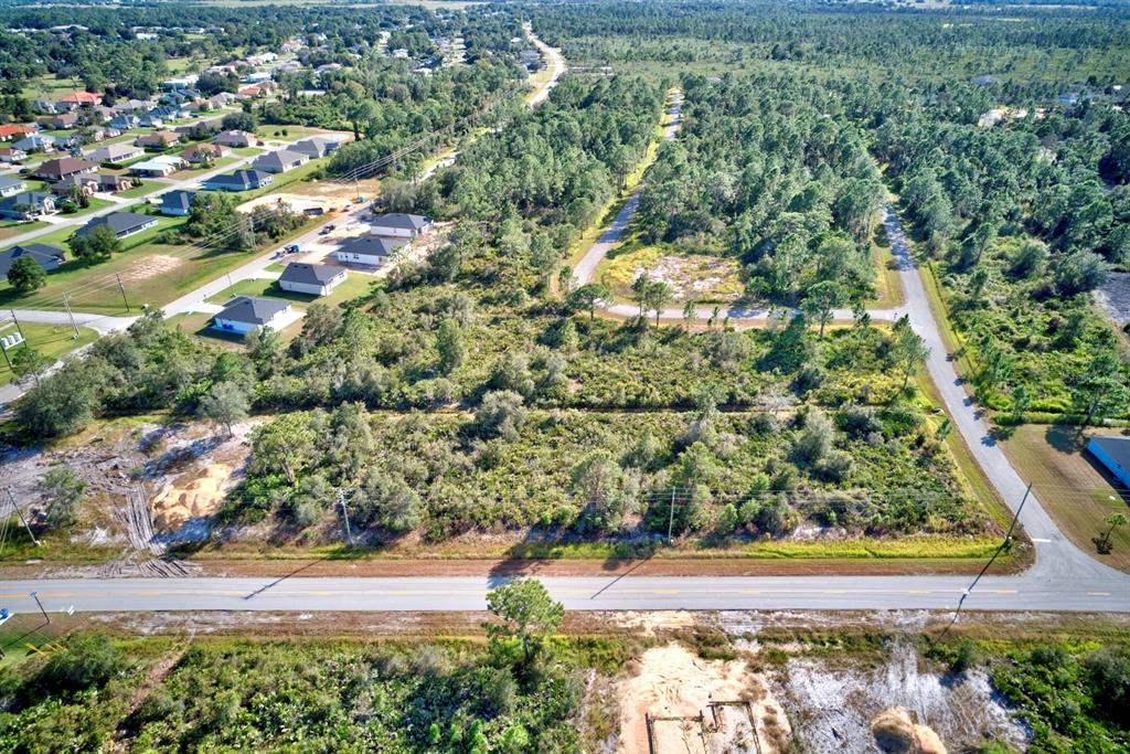 5316 Manati Avenue Sebring, FL 33872 - Photo 10 of 17 an aerial view of residential houses with outdoor space and trees
