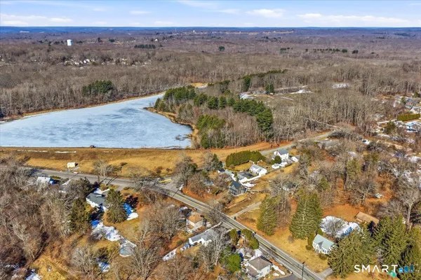 a view of a swimming pool with an outdoor space and seating area