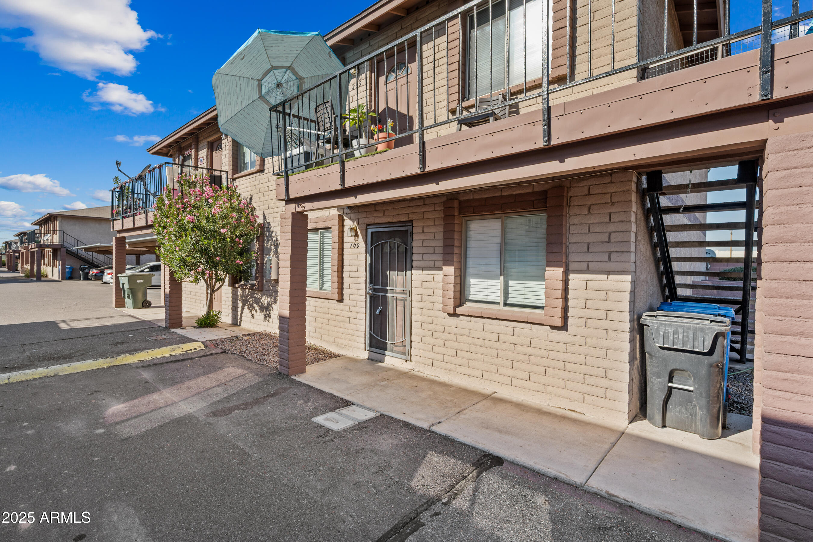1234 North 36th Street, Unit 109 Phoenix, AZ 85008 - Photo 1 of 16 a view of a house with a street