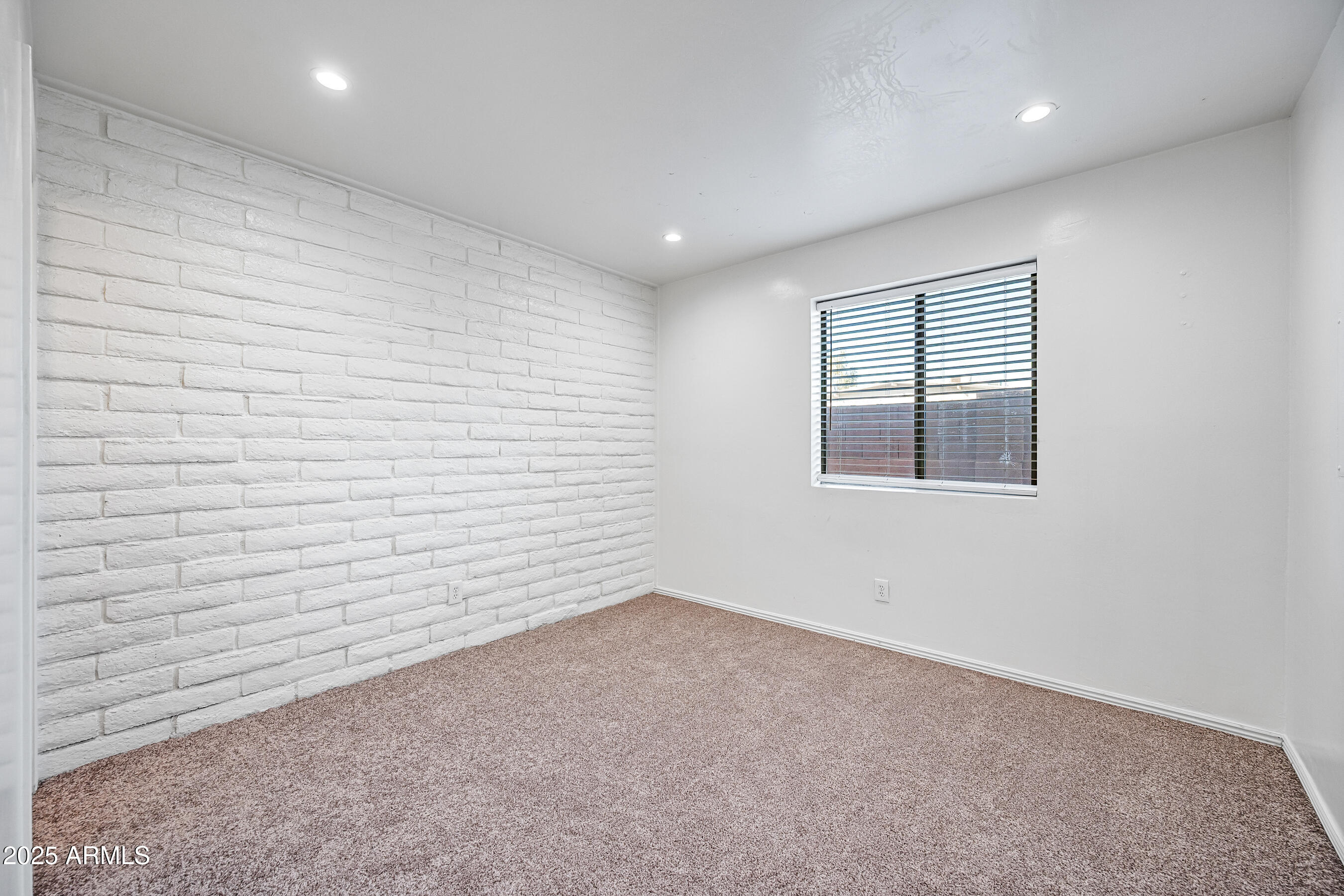 1234 North 36th Street, Unit 109 Phoenix, AZ 85008 - Photo 11 of 16 a view of an empty room
