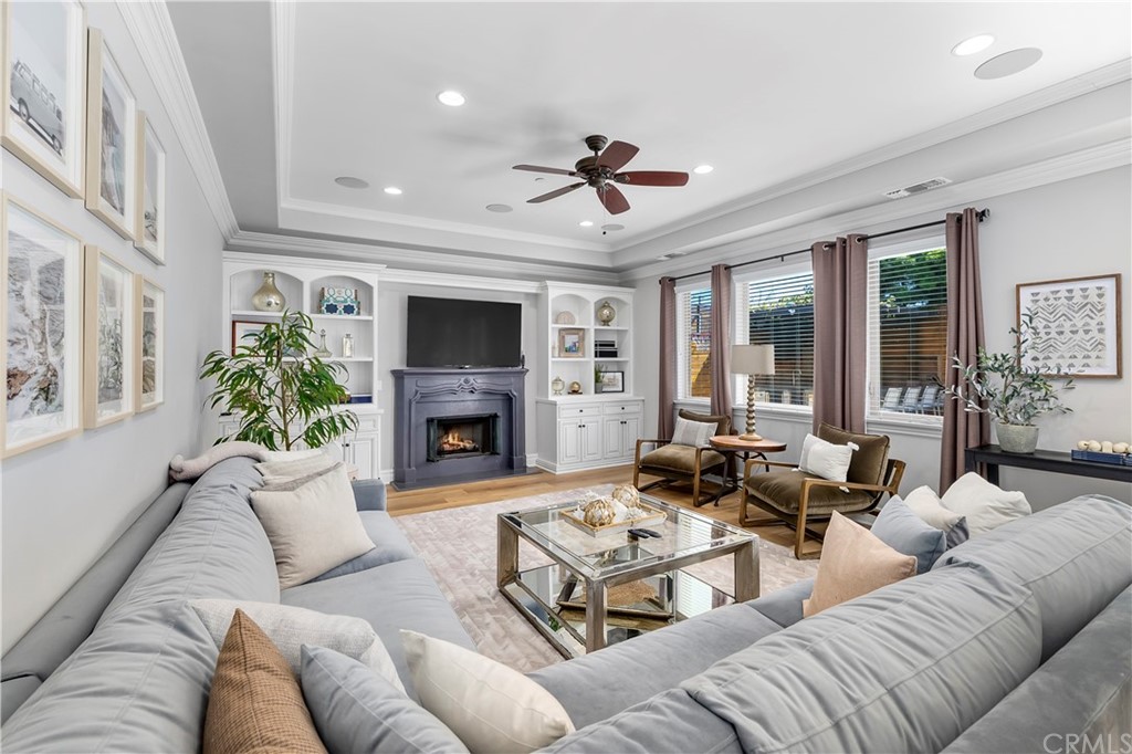 2210 Robinson Street Redondo Beach, CA 90278 - Photo 17 of 39 a living room with furniture a large window and a fireplace
