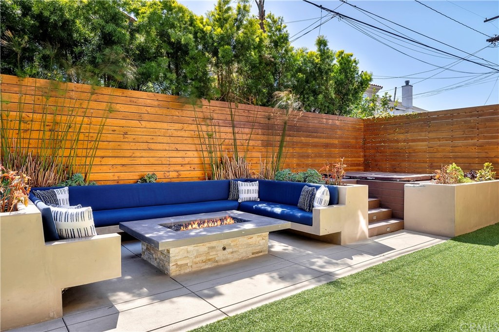 2210 Robinson Street Redondo Beach, CA 90278 - Photo 31 of 39 a view of a patio with couches chairs and a table
