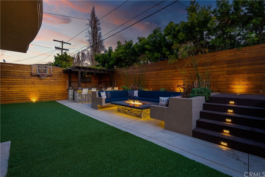2210 Robinson Street Redondo Beach, CA 90278 - Photo 33 of 39 a view of a lake with couches chairs and wooden floor