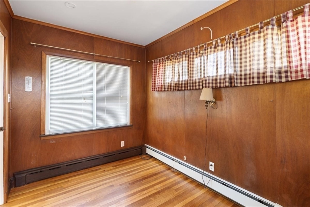 40 Riverview Street Dedham, MA 02026 - Photo 13 of 22 a view of an empty room with a window