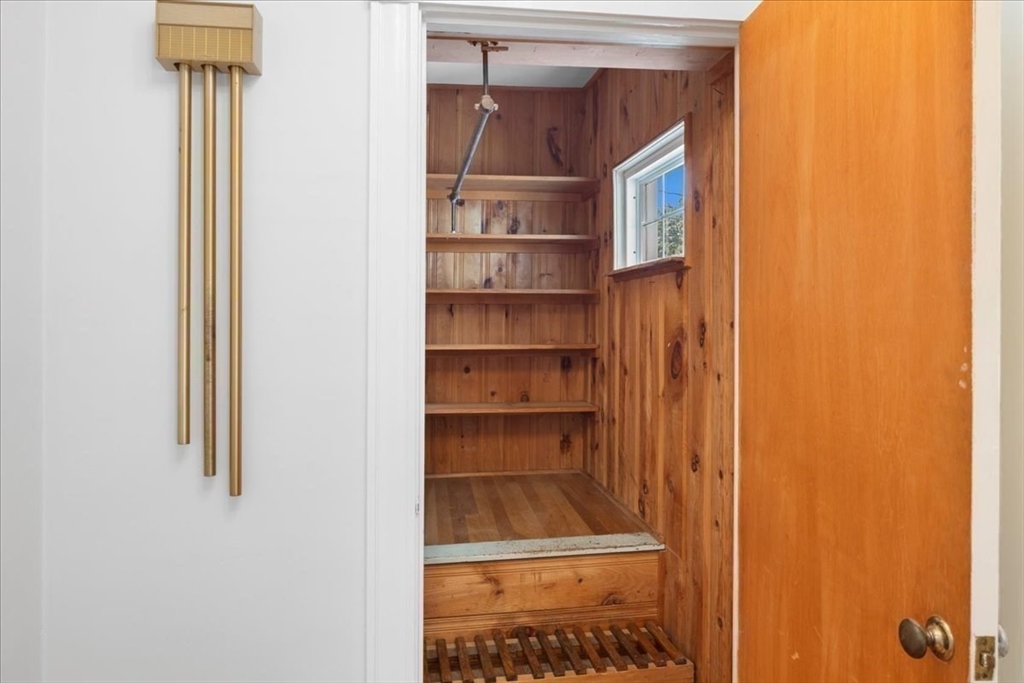 40 Riverview Street Dedham, MA 02026 - Photo 14 of 22 a view of a room with shelves