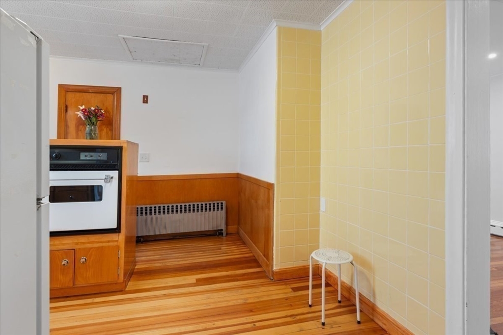 40 Riverview Street Dedham, MA 02026 - Photo 15 of 22 a view of a room with wooden floor and furniture