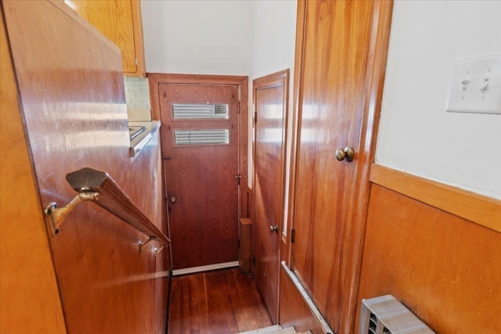 40 Riverview Street Dedham, MA 02026 - Photo 16 of 22 a bathroom with a shower and a glass door