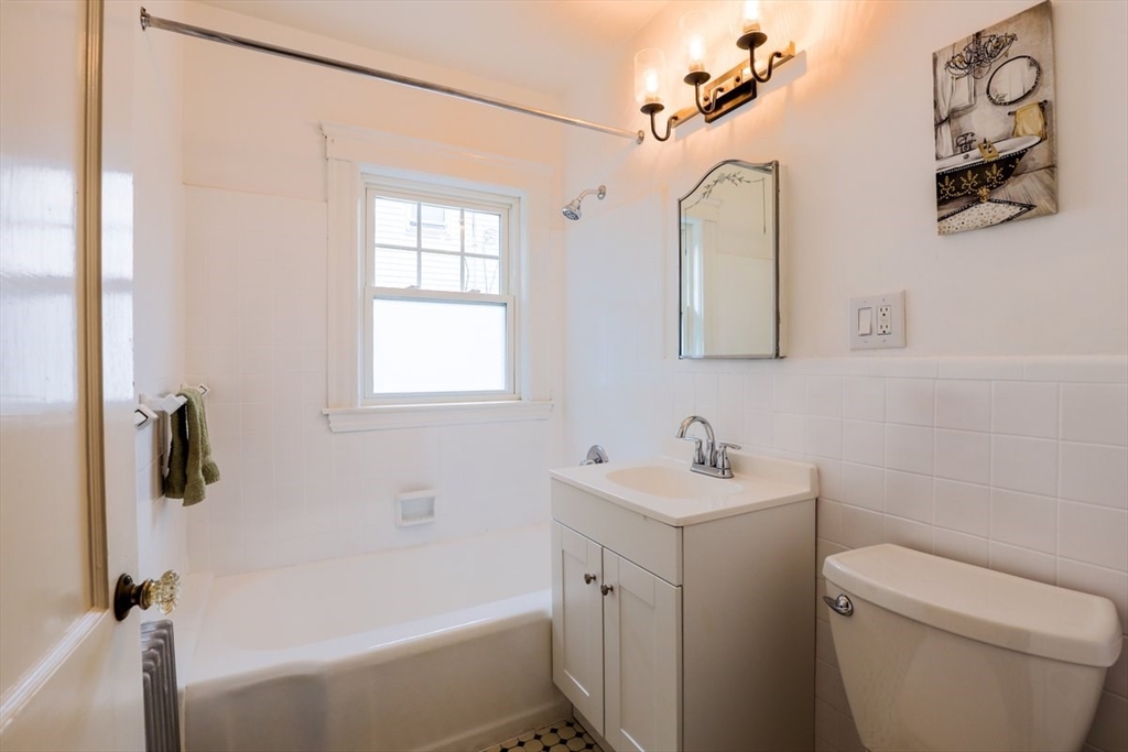 40 Riverview Street Dedham, MA 02026 - Photo 22 of 22 a bathroom with a sink toilet and shower