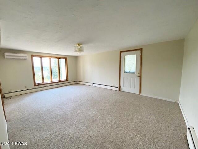 93 Miller Road Beach Lake, PA 18405 - Photo 16 of 53 an empty room with windows and closet
