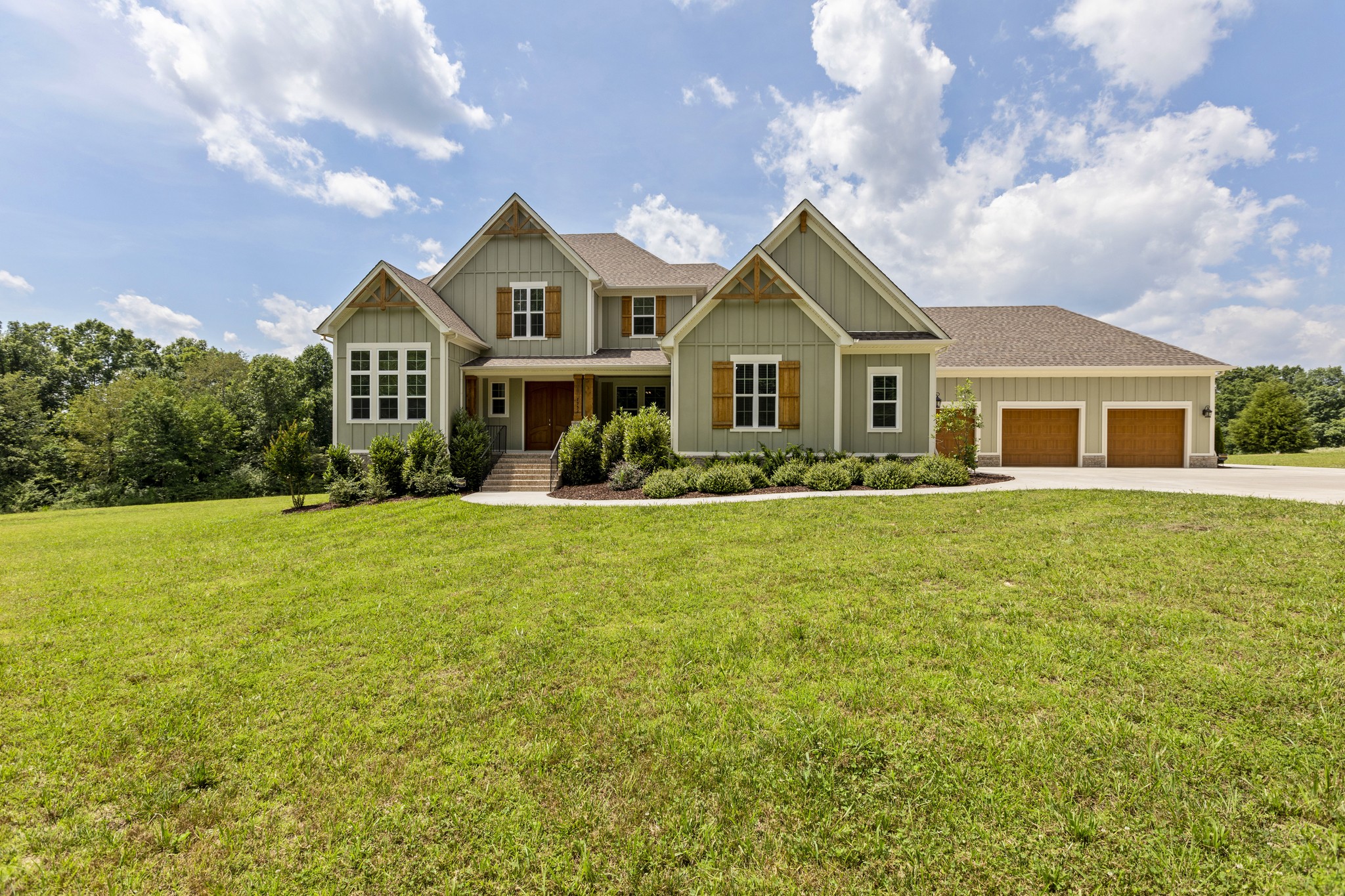 7952 Daugherty-Capley Road Primm Springs, TN 38476 - Photo 2 of 44 a front view of house with yard and green space
