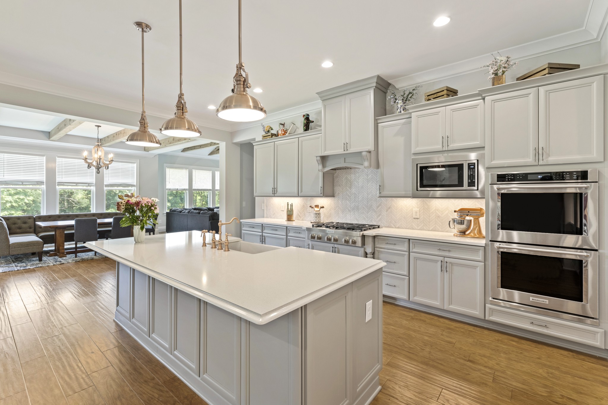 7952 Daugherty-Capley Road Primm Springs, TN 38476 - Photo 12 of 44 a large kitchen with kitchen island a large island in it