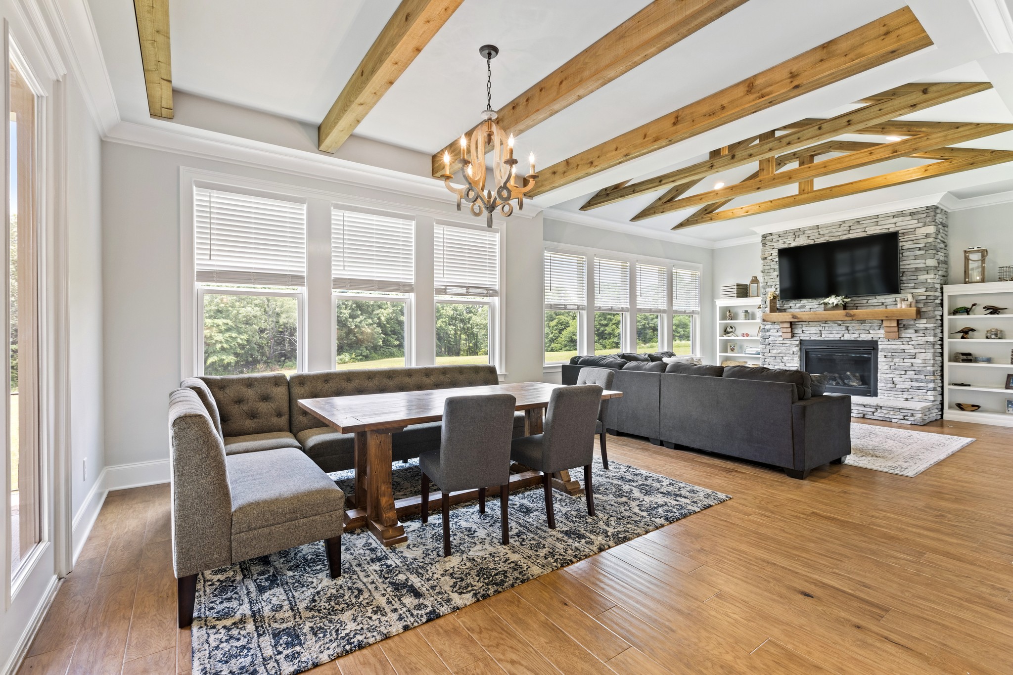 7952 Daugherty-Capley Road Primm Springs, TN 38476 - Photo 15 of 44 a view of a dining room with furniture window and wooden floor