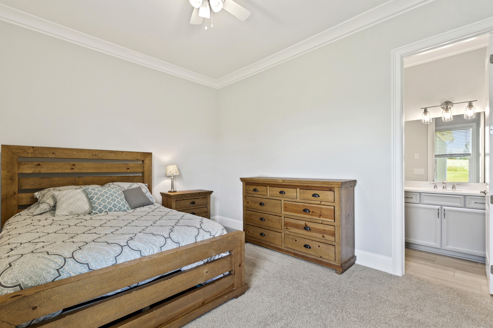 7952 Daugherty-Capley Road Primm Springs, TN 38476 - Photo 22 of 44 a bedroom with a bed and a cabinets