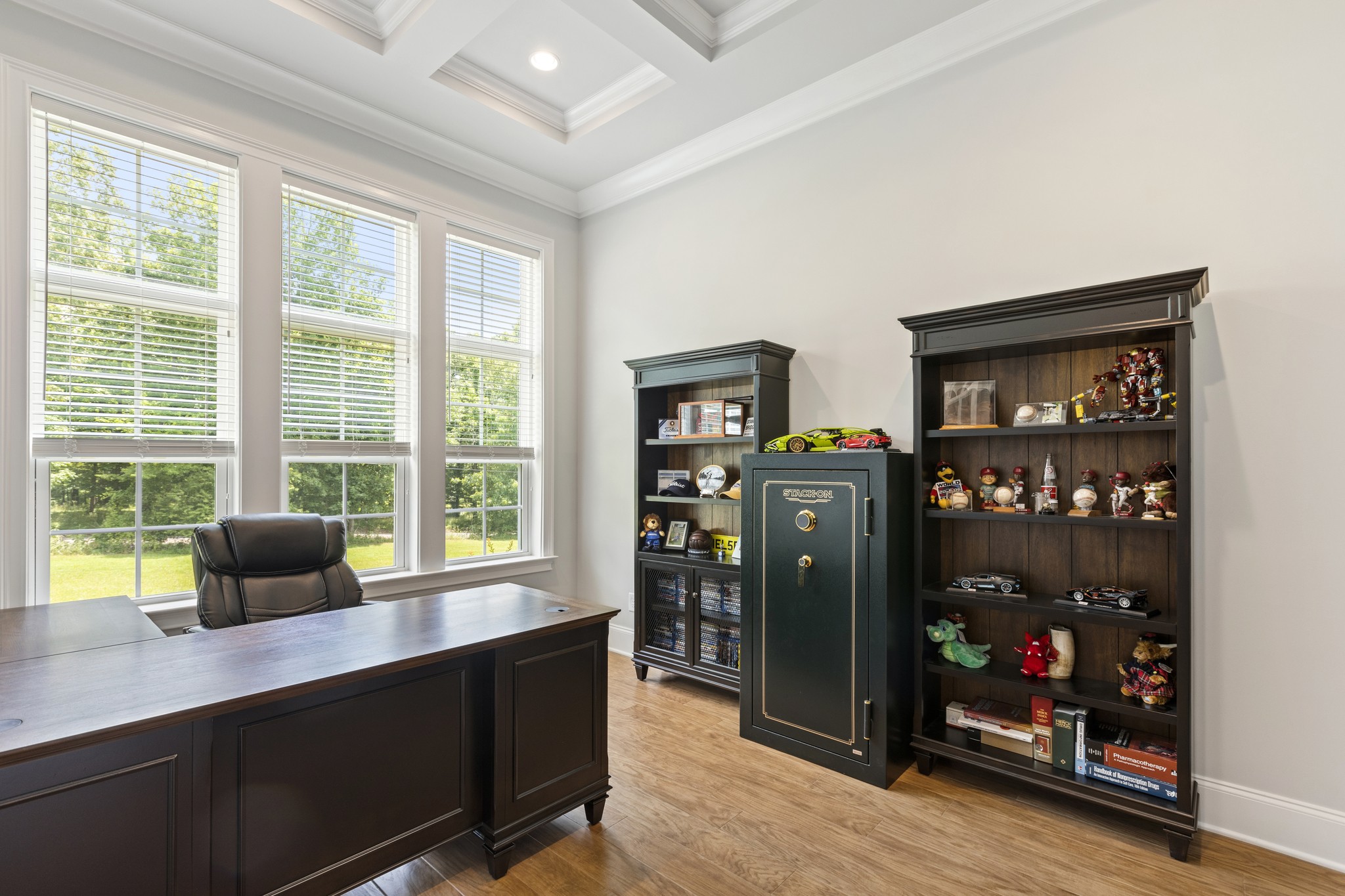 7952 Daugherty-Capley Road Primm Springs, TN 38476 - Photo 23 of 44 a view of a workspace with furniture and a window