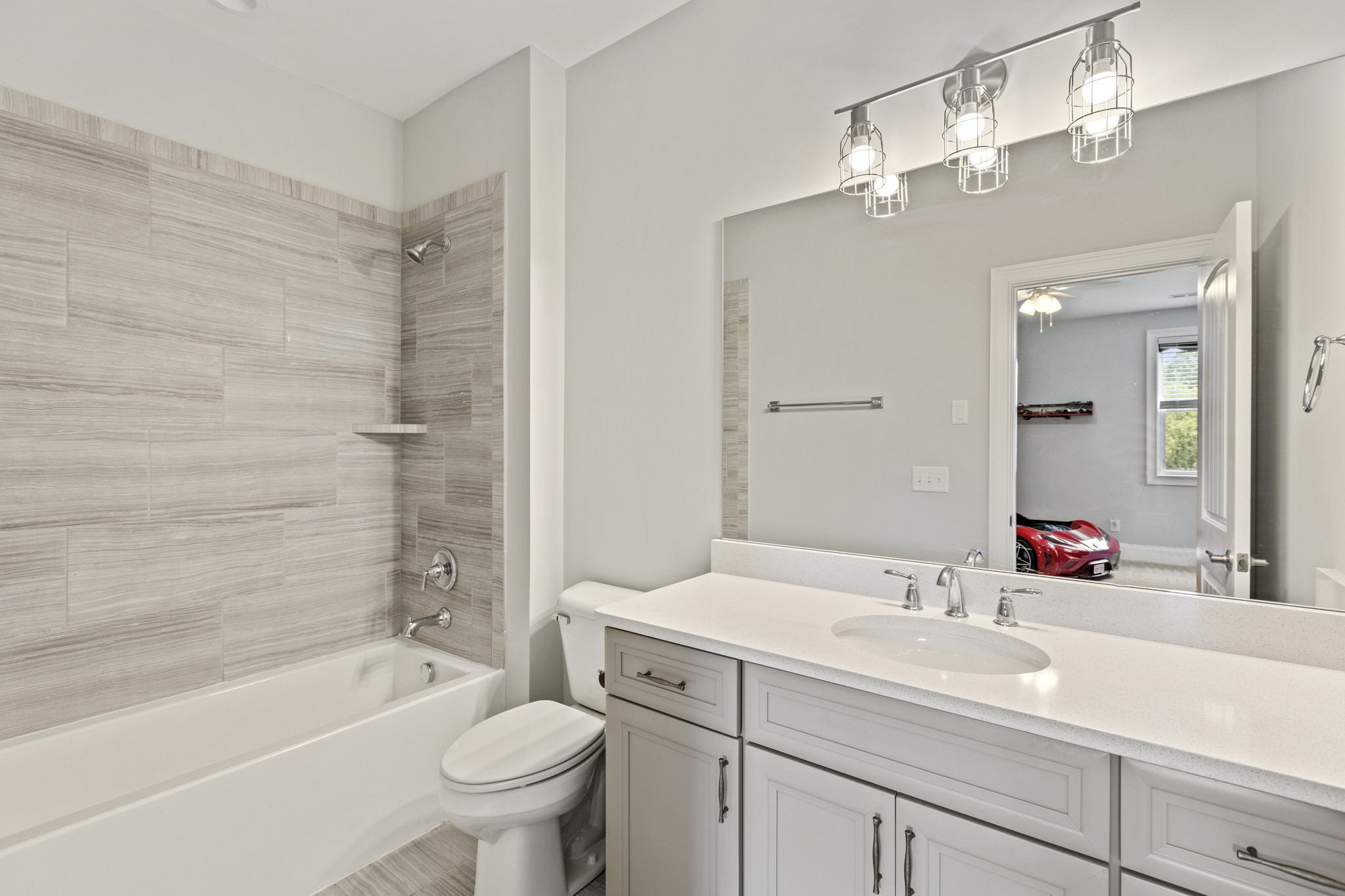 7952 Daugherty-Capley Road Primm Springs, TN 38476 - Photo 34 of 44 a bathroom with a sink a toilet and shower