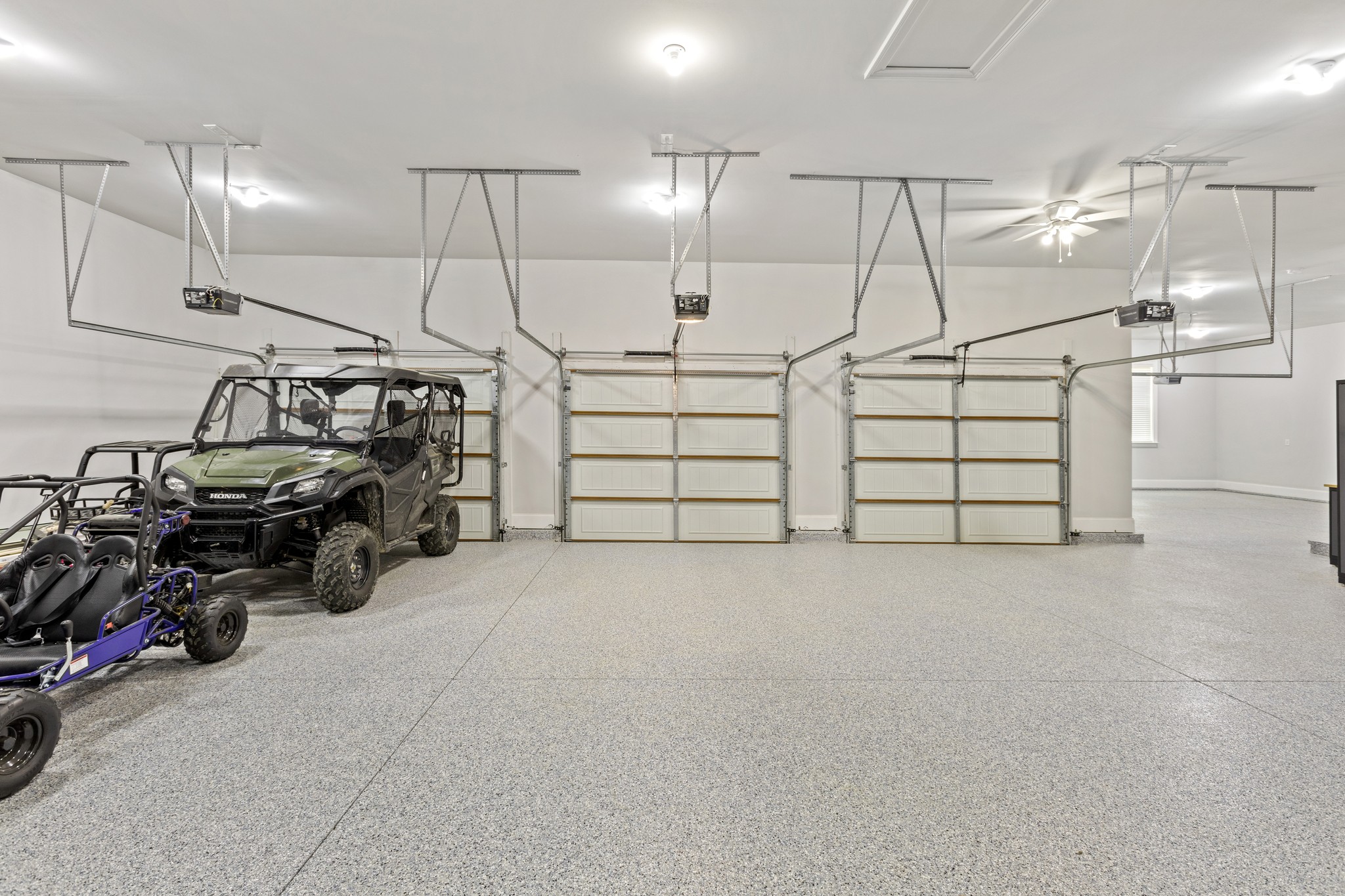 7952 Daugherty-Capley Road Primm Springs, TN 38476 - Photo 37 of 44 a view of a garage with parked cars