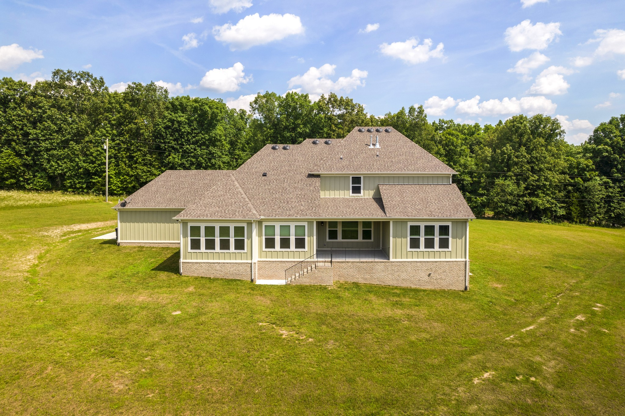 7952 Daugherty-Capley Road Primm Springs, TN 38476 - Photo 39 of 44 a view of a house with a big yard