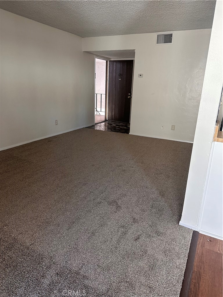 1350 West Lambert Road, Unit 120 La Habra, CA 90631 - Photo 14 of 22 an empty room with windows