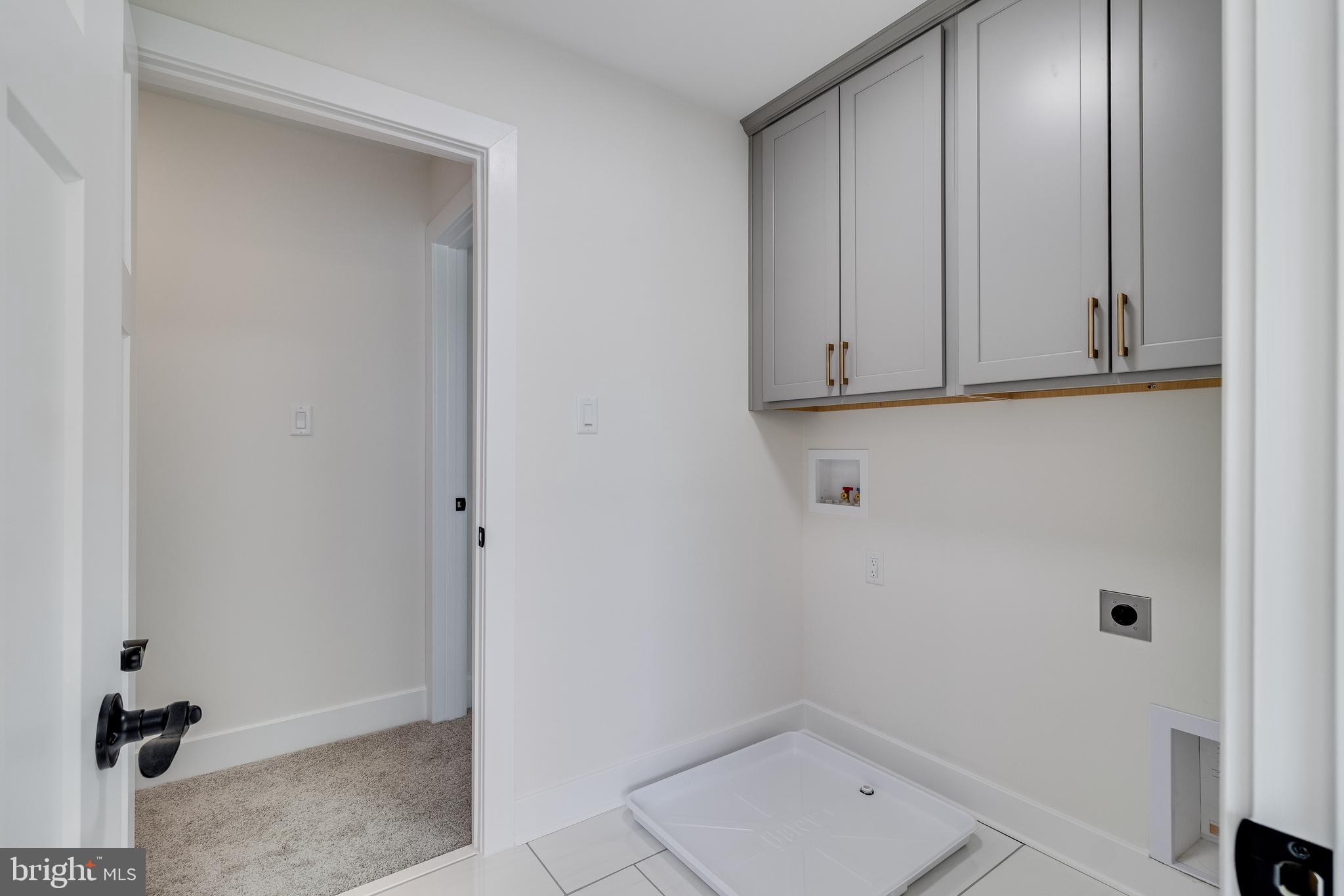 14671 Banks Odee Road Newburg, MD 20664 - Photo 33 of 60 Laundry room access from primary bath