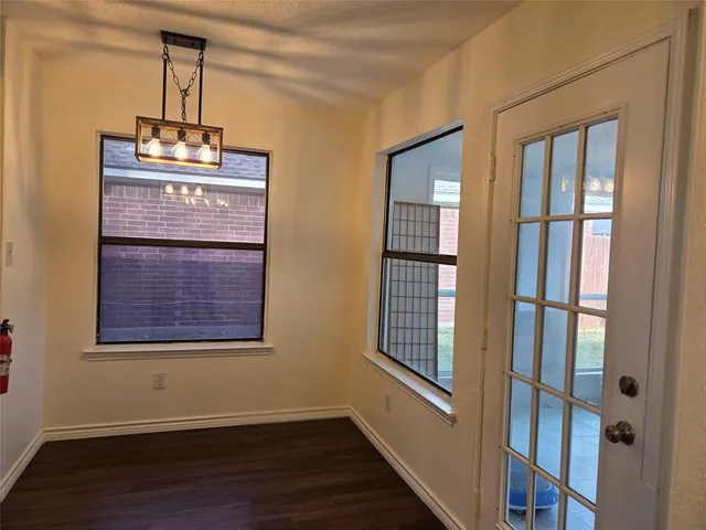 a bathroom with a sink a mirror and a shower