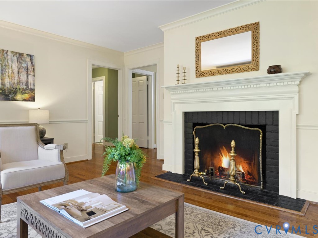 6161 River Road, Unit 36 Richmond, VA 23226 - Photo 8 of 32 Gas fireplace with wooden mantel