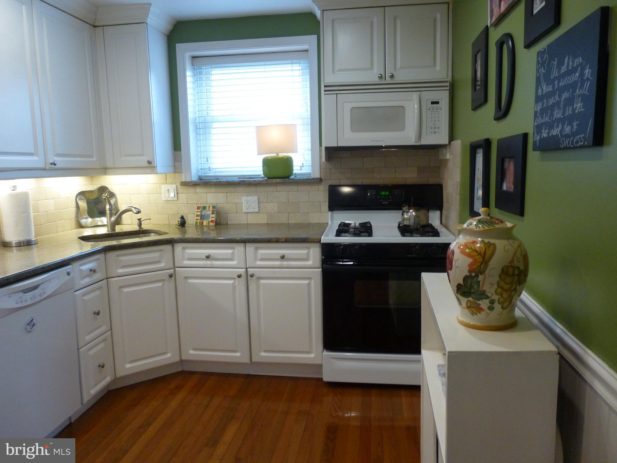 122 Barbara Drive Springfield, PA 19064 - Photo 11 of 43 Kitchen - Bright White Cabinetry