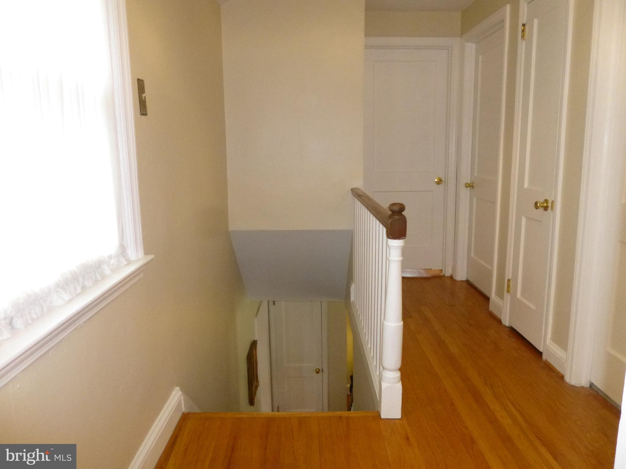 122 Barbara Drive Springfield, PA 19064 - Photo 27 of 43 Upstairs Hallway - Hardwood Floors