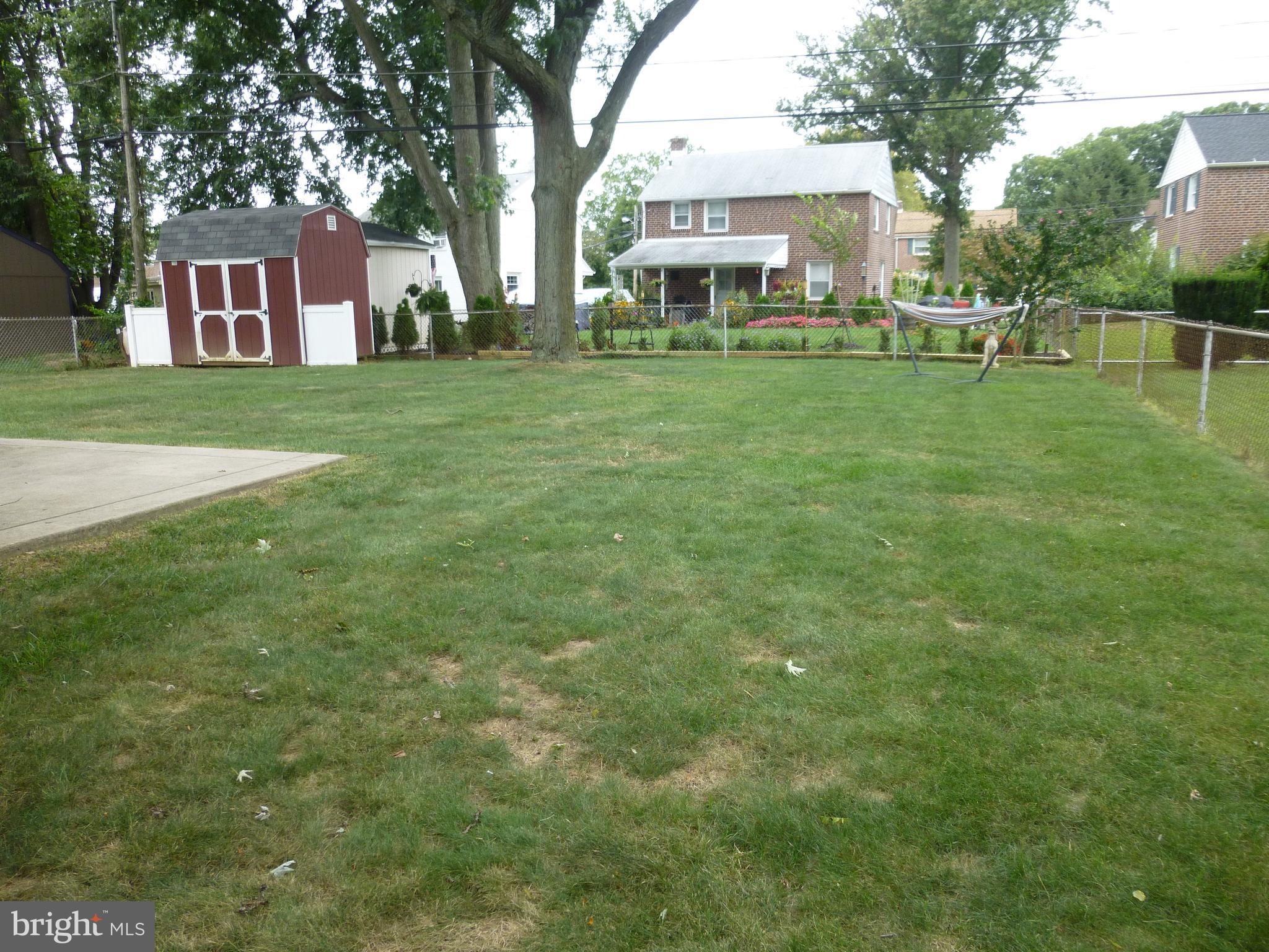 122 Barbara Drive Springfield, PA 19064 - Photo 40 of 43 Backyard - Partially Fenced - In