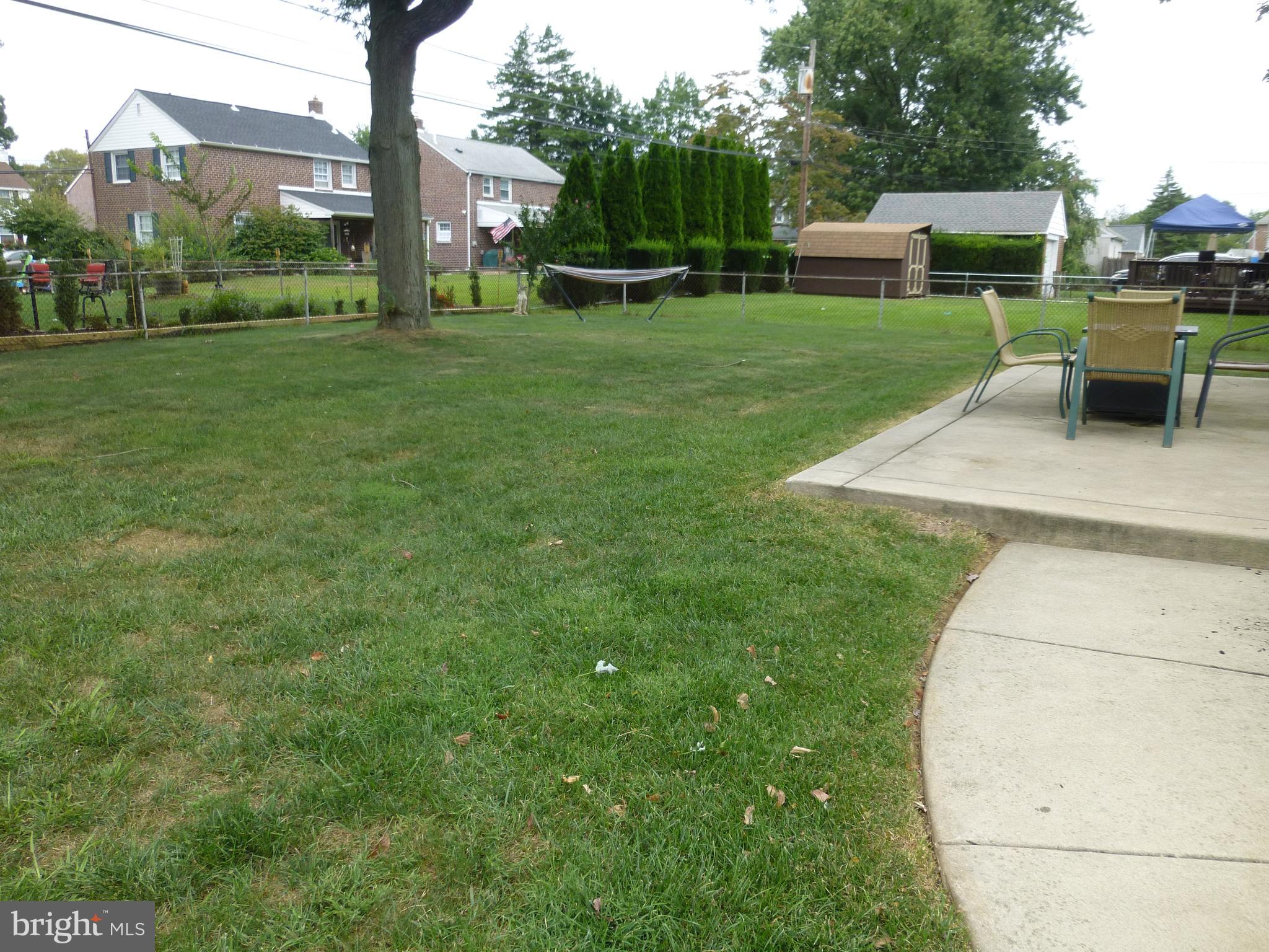 122 Barbara Drive Springfield, PA 19064 - Photo 41 of 43 Backyard - Concrete Wiggle Walkway
