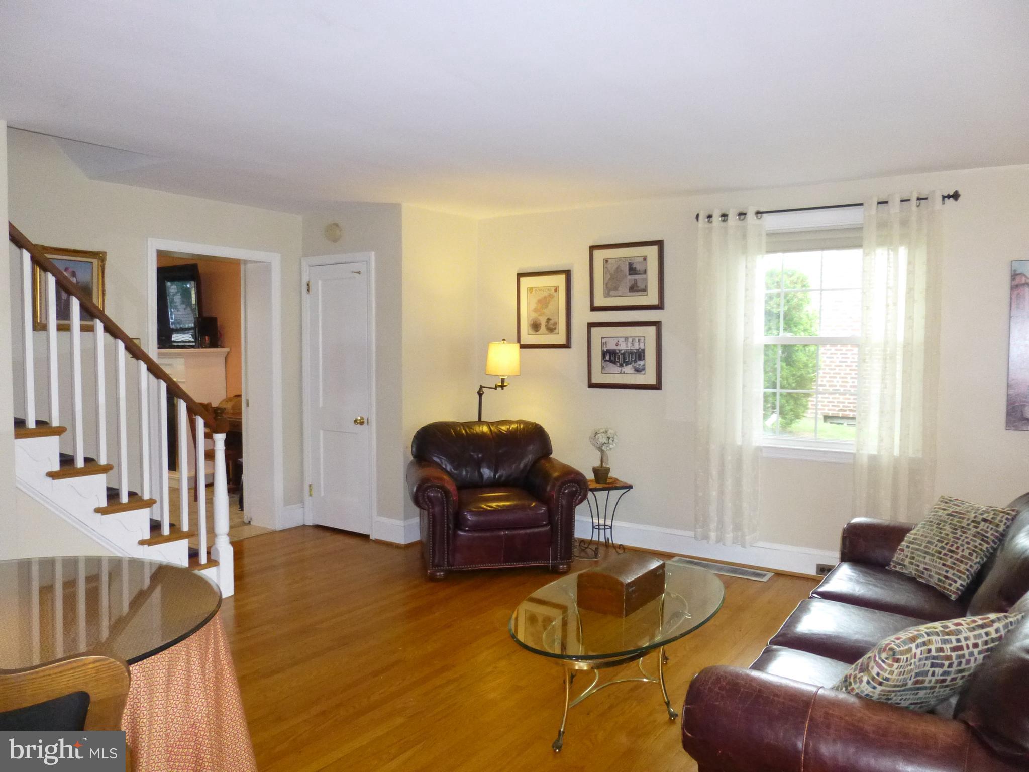 122 Barbara Drive Springfield, PA 19064 - Photo 6 of 43 Living Room - Wooden Staircase