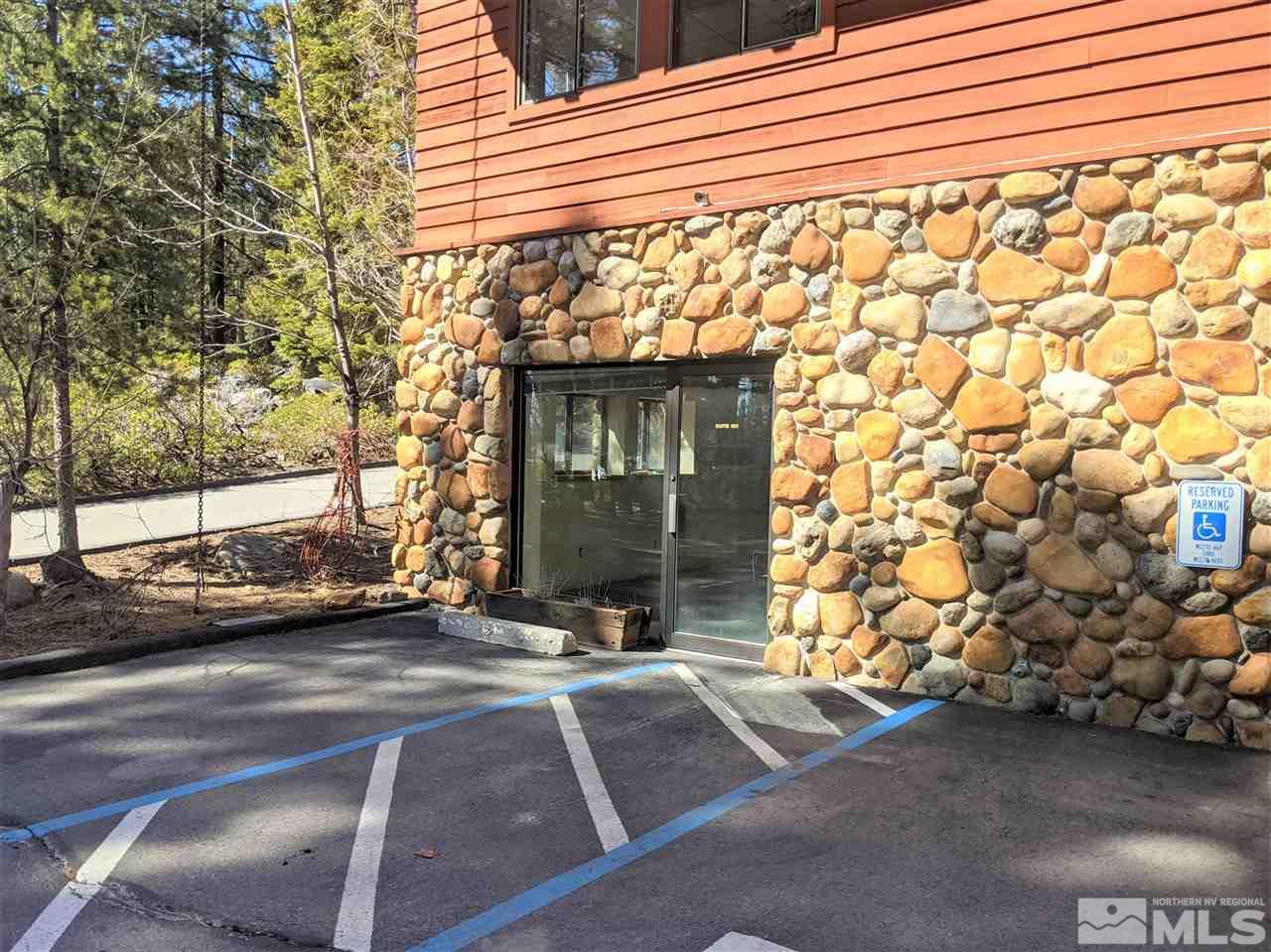 889 Alder Avenue, Unit 101 Incline Village, NV 89451 - Photo 1 of 8 a view of parking area and car parked